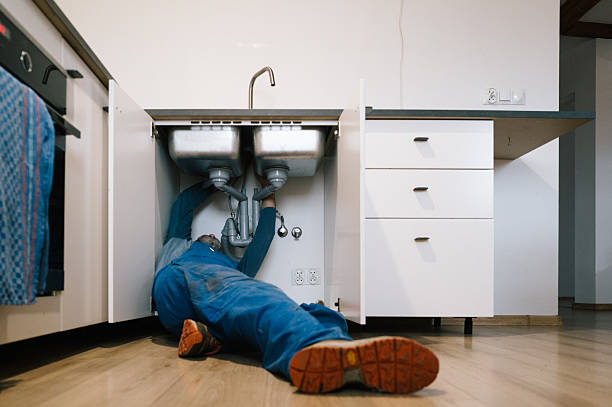 Professional Drain Cleaning technician working in Pentress, WV
